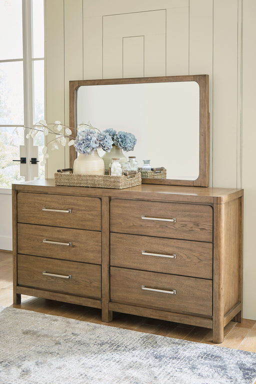 Ashley Cabalynn - Light Brown - 7 Pc. - Dresser, Mirror, Chest, King Panel Bed With Storage