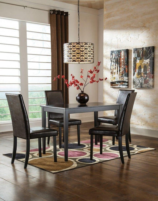 Ashley Kimonte - Dark Brown - 5 Pc. - Dining Room Table, 4 Upholstered Side Chairs