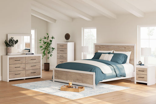 Ashley Charbitt - Two-tone - 7 Pc. - Dresser, Mirror, Chest, King Panel Bed, 2 Nightstands